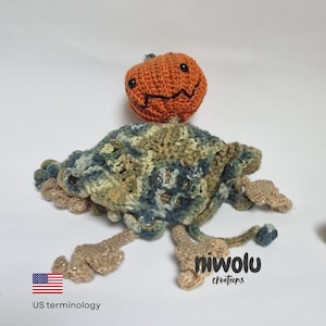 Crochet pattern PDF - Halloween pumpkin scarecrow softie with shroud and lanky arms and legs. Clear instructions with picture guides