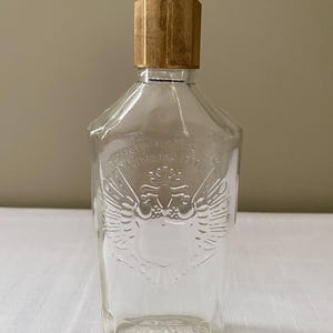 MYCKET SÄLLSYNT - 1970-talets "Smirnoff" Double Eagle Crest Flask Bar Bottle Man Cave Tom Karaff