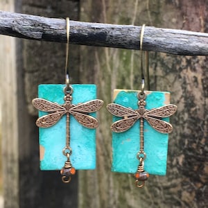 Verdigris brass rectangle and brass dragonfly earrings with orange Czech glass beads