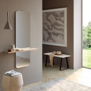 May include: A contemporary hallway featuring a wooden shelf and a rectangular mirror. The shelf is fixed to the wall and has a rounded edge. The mirror is mounted on the wall and has a rounded top edge. A white bench with black legs is in the foreground. A hat and scarf are on the bench. The wall is a light brown colour.