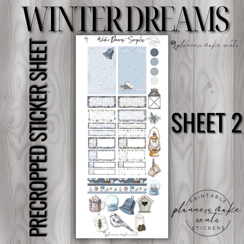 May include: A pre-cropped sticker sheet with a winter theme. The sheet features various stickers with illustrations of bells, lanterns, snow globes, and a blue jay. The text "WINTER DREAMS" and "SHEET 2" are visible.