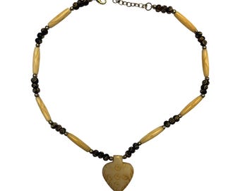 Mid-Century Tribal Bone Necklace: Spade Pendant & Carved Seed Beads