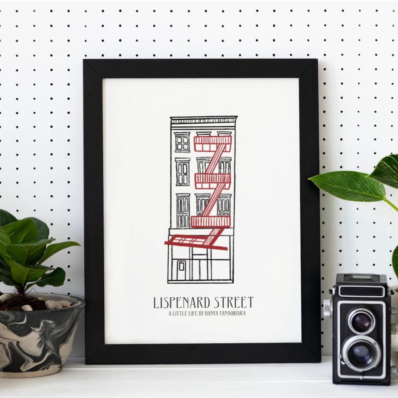 May include: Black and white illustration of a building with a red fire escape. The building has a sign that reads "Lispenard Street, A Little Life by Hanya Yanagihara".