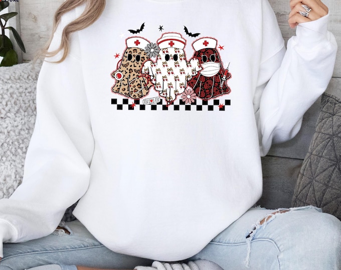 Halloween Nurse Sweatshirt, Ghost Nurse Sweater, Spooky Nurse Gift, Leopard Skull Bow Nurse Hoodie, Medical Sweatshirt, Nurse Gift