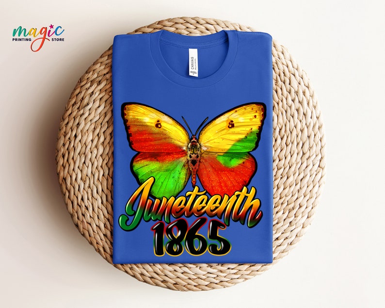May include: A royal blue t-shirt with a colorful butterfly graphic and the text "Juneteenth 1865".