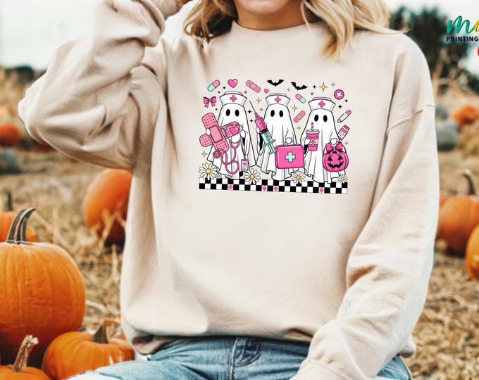 Halloween Nurse Sweatshirt, Pink Nurse Ghost Coquette Sweater, Retro Checkered Nurse Bow Sweatshirt, Spooky Season Boo Boo Crew Sweatshirt