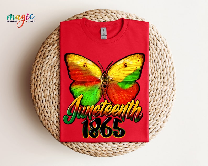 May include: Red t-shirt with a colorful butterfly graphic and the text "Juneteenth 1865".