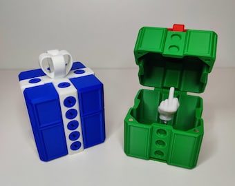 Caja de regalo impresa en 3D. Dedo medio oculto en el interior. Colores personalizados.