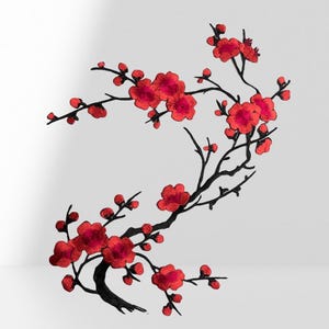May include: Red embroidered cherry blossom flower applique with black stems and branches.