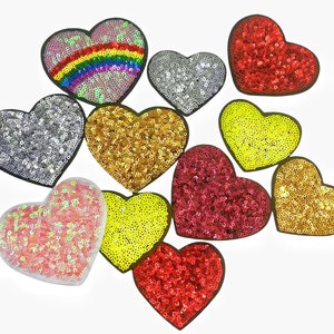 May include: Assortment of ten heart-shaped sequin patches in various colors, including red, pink, gold, silver, and yellow. The patches are perfect for adding a touch of sparkle to clothing, bags, or other accessories.