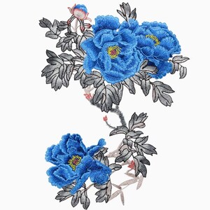 May include: Embroidered blue flower patch with gray leaves and stems. The flowers are in bloom and have a delicate, intricate design.