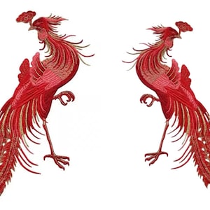 May include: Two red embroidered phoenixes with gold accents. The phoenixes are facing each other and have their wings spread out. They are both standing on their feet and have their heads turned to the side.
