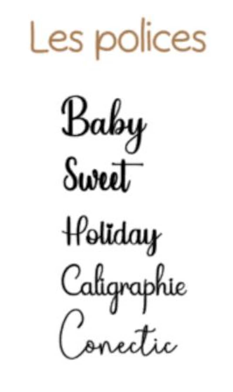 May include: A white background displays the text "Les polices" in a brown, handwritten font. Below, five words are written in black, stylized fonts: Baby, Sweet, Holiday, Caligraphie, and Conectic.
