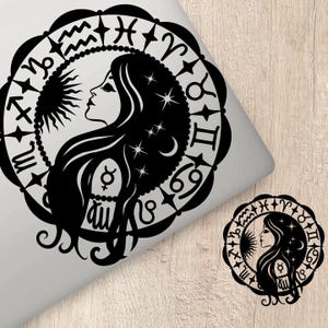 May include: Black and white illustration of a woman's face with long hair surrounded by a circle of zodiac symbols. The symbols include Aries, Taurus, Gemini, Cancer, Leo, Virgo, Libra, Scorpio, Sagittarius, Capricorn, Aquarius, and Pisces.