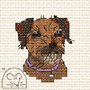 May include: A pixelated image of a dog's face, mainly brown with darker brown and black accents. The dog wears a purple collar. The background is a light beige brick pattern. A small, blurry graphic is in the lower left corner.