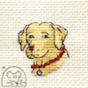 May include: A cross-stitch image of a golden Labrador Retriever. The dog wears a red collar with a tag. The background is a light beige, textured fabric. A small, blurry outline of a dog house is in the lower left corner.
