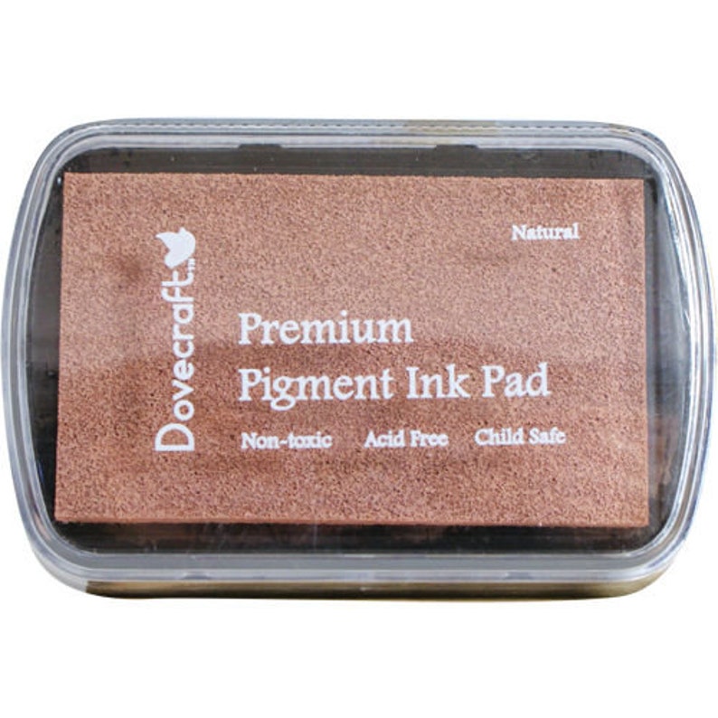 May include: A Dovecraft Premium Pigment Ink Pad in the colour Natural. The ink pad is non-toxic, acid free, and child safe.