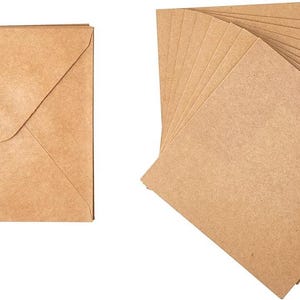 May include: A square, kraft paper envelope with a flap closure is shown next to a stack of matching square cards. The paper has a natural, light brown color and a slightly textured surface. The cards are fanned out, displaying their edges.