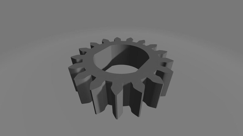 May include: A matte grey gear featuring sixteen evenly spaced teeth around its circular perimeter and a central opening with a flat-sided inner edge, presented against a neutral grey background to highlight its mechanical form and structure.