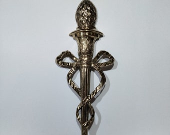 beautiful, large brass candle sconce, pineapple and bow design