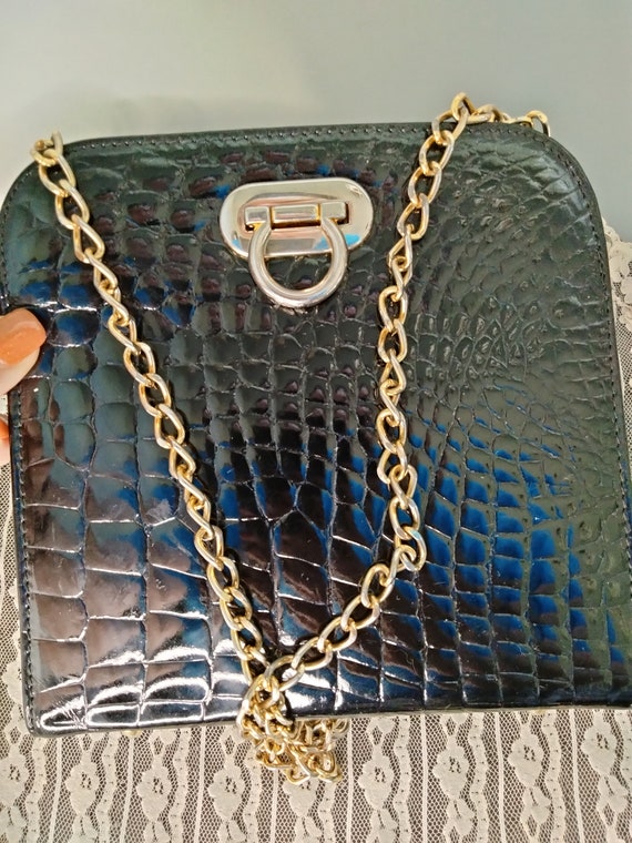 black purse with gold chain, made in italy - image 1