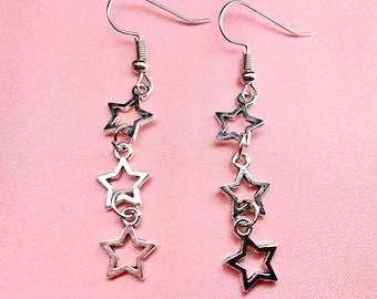 Pretty cute funky y2k style silver star long dangly earrings
