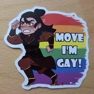 May include: A die-cut sticker featuring an anime-style character with dark hair in a topknot, wearing brown and black armour, running forward. The background is a rainbow-coloured brushstroke design with the white text MOVE I'M GAY! in bold letters.