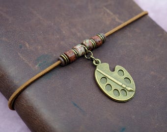Travelers notebook band, adjustable notebook band with ceramic beads and bronze palette charm