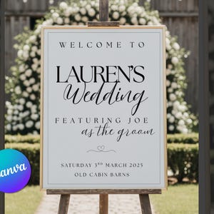 May include: A wedding welcome sign on a wooden easel. The sign reads "WELCOME TO LAUREN'S Wedding FEATURING JOE as the groom" in elegant black script. The date is Saturday 3rd March 2025, at Old Cabin Barns. A Canva logo is in the bottom left corner.