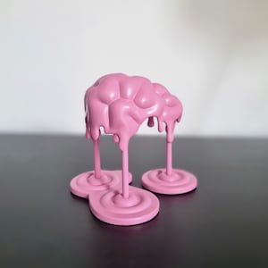 Melting brain designer art toy sculpture