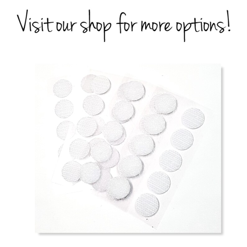 May include: A close-up of a sheet of white adhesive dots. The dots are round and have a textured surface.