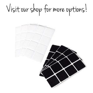 May include: Two sets of adhesive squares, one white and one black. Each set has 16 squares.