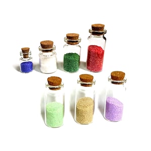 Mini glass bottles with colored sand - Beach sand in a bottle with cork tops for Beach theme party favors, DIY charms, pendants, & crafts.