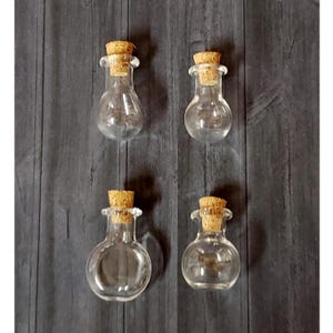 Small shaped glass bottle with cork, Fillable tiny glass heart vial for DIY crafts, Mini bottles with cork for charms and pendants.
