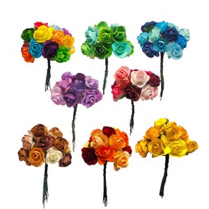 May include: A collection of colorful paper rose bouquets. The bouquets feature a variety of colors, including rainbow, green, blue, purple, pink, brown, orange, and yellow. Each bouquet has a dark green stem.