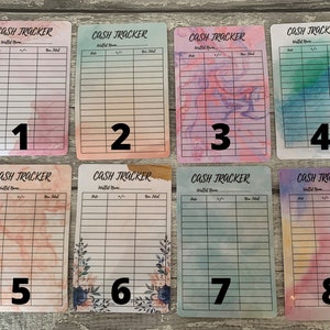 May include: Eight colorful cash tracker cards with watercolor backgrounds. Each card has a different design, including pink, blue, purple, and green hues. The cards are labeled with the text "CASH TRACKER" and numbered 1 through 8.
