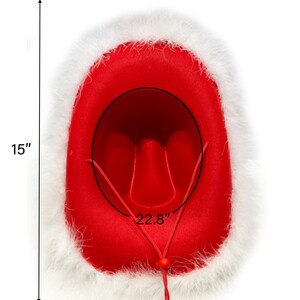 May include: Red cowboy hat with a white faux fur trim. The hat is 12 inches tall and 22.8 inches in circumference.