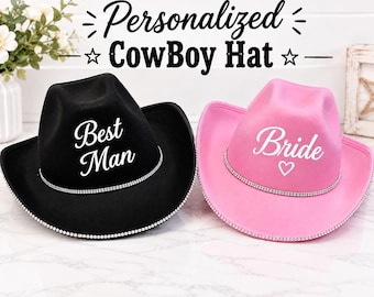 May include: A black cowboy hat with the text Best Man and a pink cowboy hat with the text Bride and a heart symbol. Both hats feature a silver rhinestone trim around the crown and brim. The text Personalized CowBoy Hat is visible above.