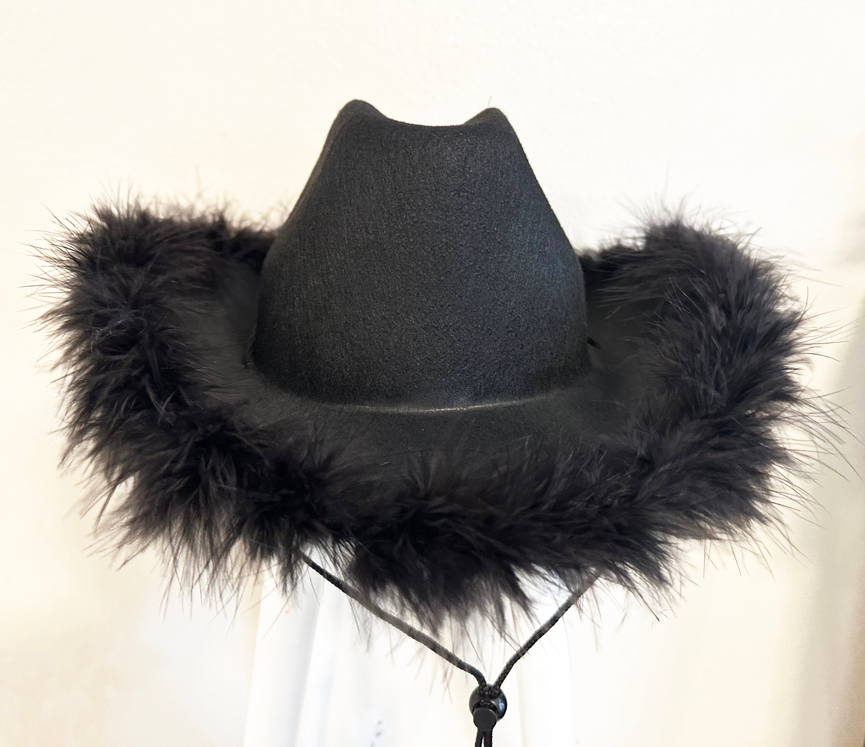 White Felt Cowboy Hat With Royal Blue Feather Boa 