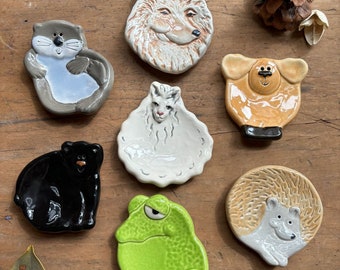 Cute animal dishes- wolf, sloth, black bear, moose, hedgehog, frog, llama. These functional ceramic dishes are spoon rests, tea bag holders