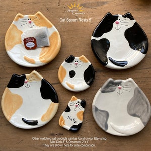 Calico cat spoon rest and spotted cat spoon rest. These spotted and calico cat dishes can also be used as a tea bag holder or a soap dish.