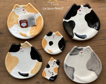Calico cat spoon rest and spotted cat spoon rest. These spotted and calico cat dishes can also be used as a tea bag holder or a soap dish.