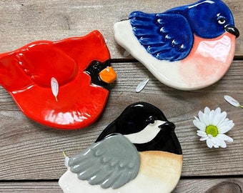 Bird lovers and bird watchers. Cardinal, Bluebird & Chickadee ceramic dish and ornament. Colorful tea bag holder, spoon rest, and ring dish.