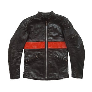 May include: A black leather motorcycle jacket with a red stripe across the chest. The jacket has a zip fastening and multiple pockets.
