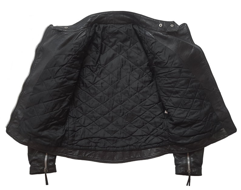 May include: Black leather jacket with a quilted lining. The jacket has a zipper closure and two pockets on the front.