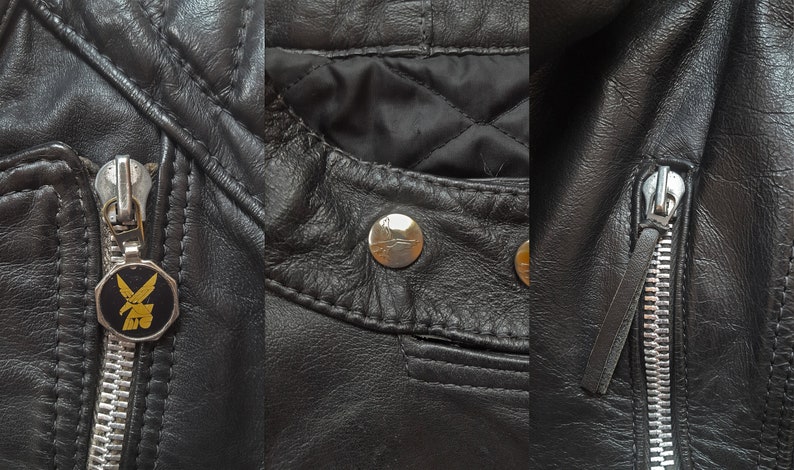 May include: Close-up of a black leather jacket with silver zippers and a gold eagle logo on the zipper pull. The jacket has a quilted lining and a snap button closure.