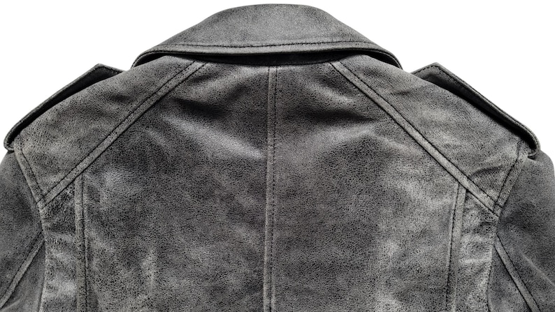 May include: A gray leather jacket with a distressed look. The jacket has a collar and a zipper closure.