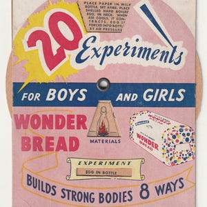 May include: A pink and yellow vintage Wonder Bread advertisement with a cutout wheel. The wheel has a picture of a bottle and a burning match, and the text "20 Experiments for Boys and Girls". The text "Wonder Bread Builds Strong Bodies 8 Ways" is printed on the bottom of the advertisement.