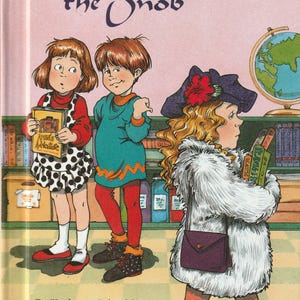 May include: A book cover illustration featuring three children. The book title is "Samantha the Snob". The book is a Step 2 book for grades 1-3. The illustration shows a girl in a polka dot dress holding a book titled "Aladdin's Adventure", a boy in a blue sweater and red pants, and a girl in a white fur coat holding a stack of books.
