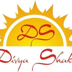 May include: A graphic logo featuring a stylised yellow sun with sharp rays. Centred on the sun are the red letters DS in a cursive font. Below the sun, the text Divya Shakti is written in a matching red cursive script on a white background.